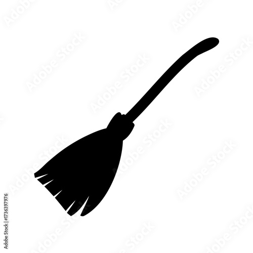Silhouetted witch's broom with wooden handle, bristles on a white background