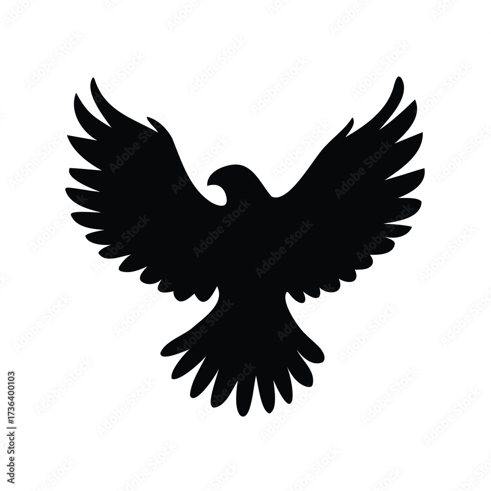Fototapeta premium Black silhouette of an eagle spreading its wings, showing powerful freedom