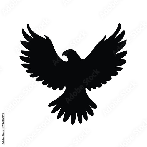 Black silhouette of an eagle spreading its wings, showing powerful freedom