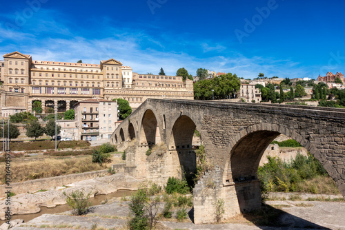 Historic Pont Vell Bridge Manresa Barcelona Spain Medieval Arches and Baroque Sant Ignasi Sanctuary on Cliff
