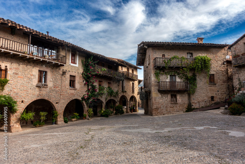 Picturesque Medieval Firal dels Bous Square Santa Pau Gerona Spain 13th Century Arcaded Stone Facades and Balconies