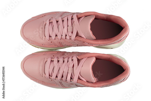 Pair of woman's sneakers isolated from background. Pink color. Top view