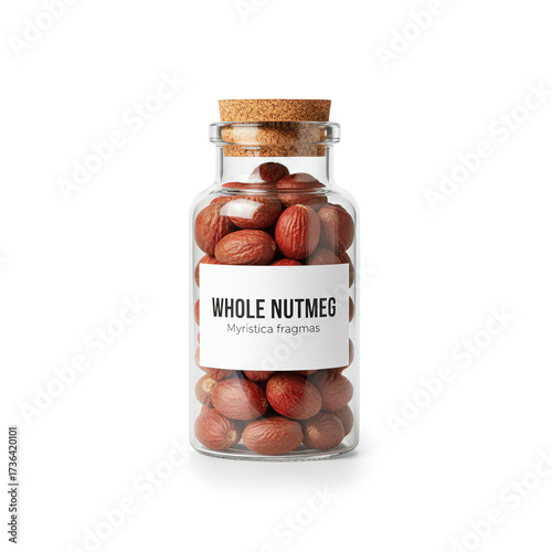 A glass jar of whole nutmeg on white background