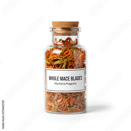 A glass jar of whole mace blades on white background