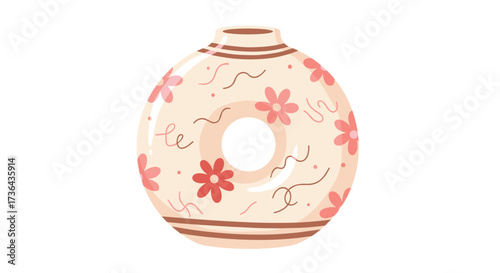 A decorative ceramic vase with a donut shape and floral patterns.