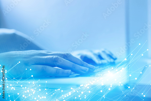 A person is typing on a laptop computer