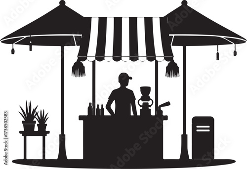 Silhouette of a street vendor at a kiosk with umbrellas