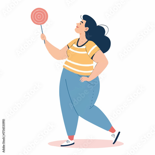 Woman walking and holding a lollipop with a cheerful expression  