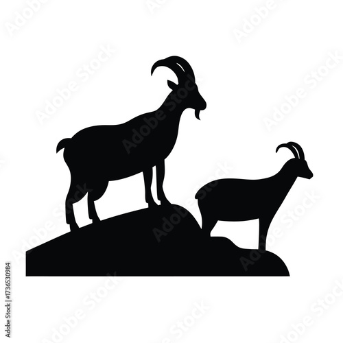 Silhouette of two majestic ibex goats standing on a rocky outcrop against a white background