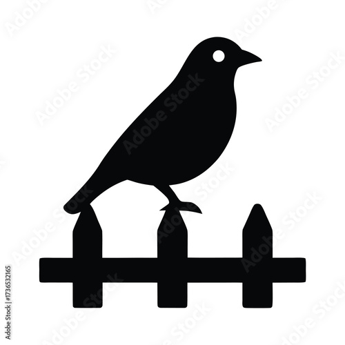 Silhouette of a small bird perched on a black picket fence against a white background