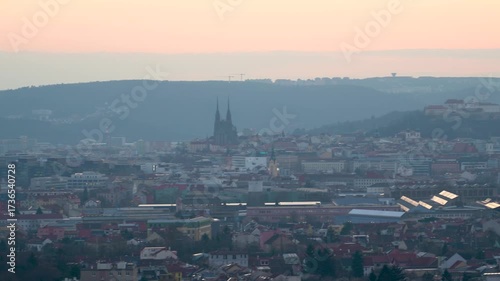 Brno, Czech Republic - March 29, 2025: View of the city from above at night. Evening city panorama. Špilberk Castle