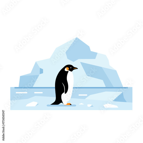 A solitary Emperor Penguin stands on an icy surface with a large iceberg behind it.