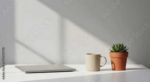 Clean office desk setup with computer and coffee mug
