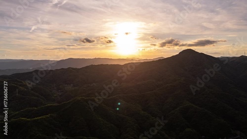 Aerial hyperlapse of sunset over mountains in Okayama prefecture, Japan