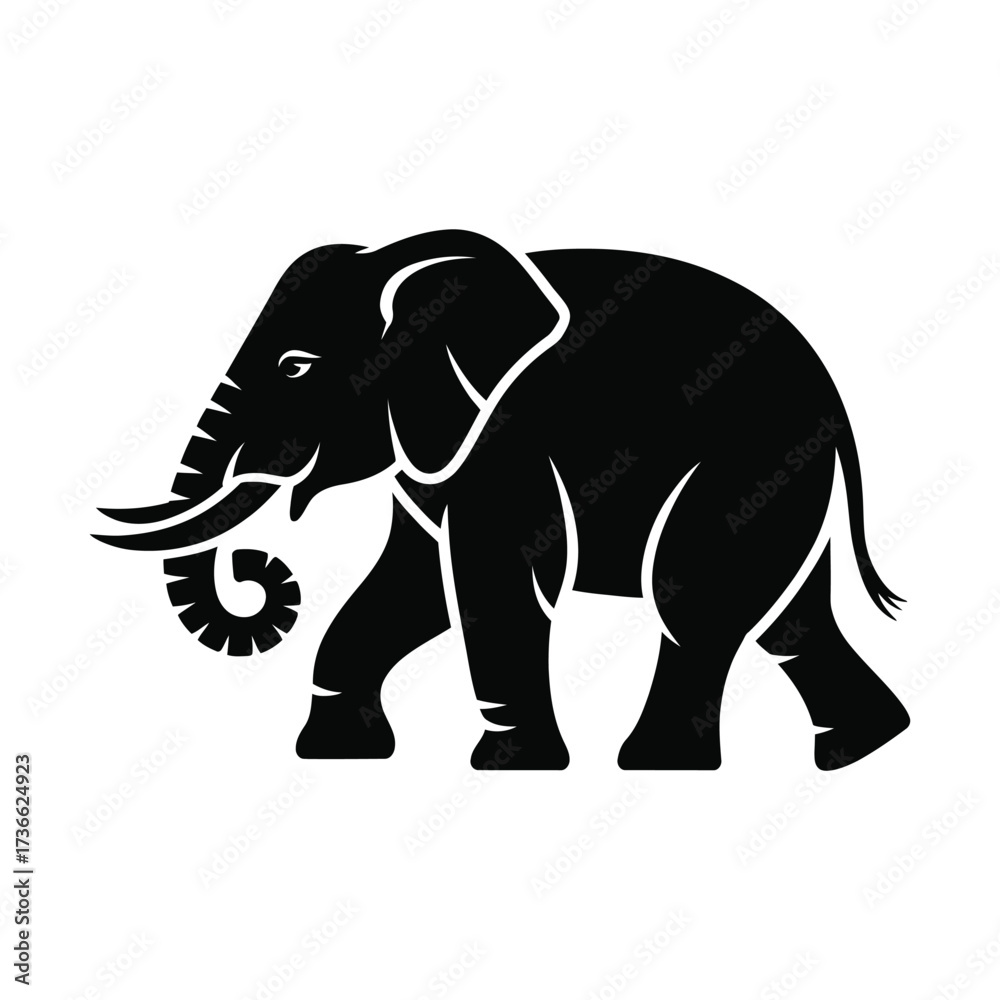 Fototapeta premium Silhouette of an african elephant walking