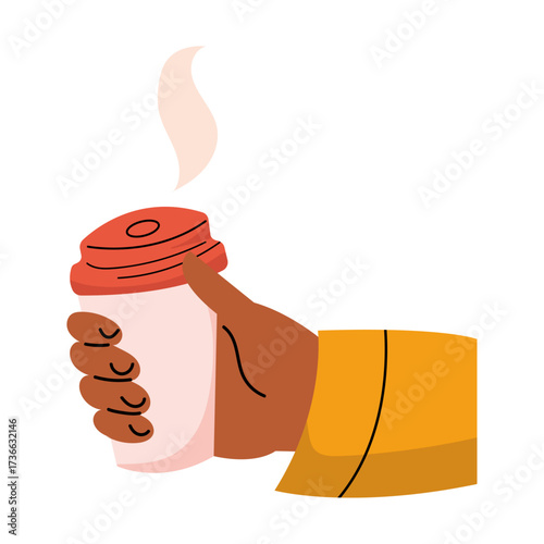 Holding a warm cup of coffee with steam rising in a cozy atmosphere during a chilly morning