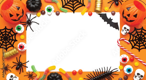 Spooky halloween flat lay background with pumpkins spiders candy and blank white space