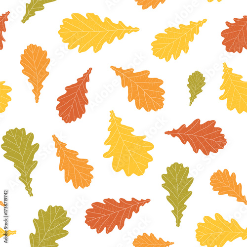 Abstract botanical pattern. Seamless print composed of green, yellow, red, orange silhouette of leaves of oak on white background. Botanical colorful background.