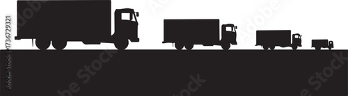 Four black truck silhouettes of varying sizes lined up on a dark horizontal surface against a white background