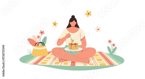 Person Enjoying Breakfast Outdoors on Picnic Mat with Pancakes and Flowers