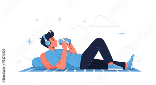 Relaxed Youth Enjoying Beverage And Music While Outdoors On A Comfortable Rest