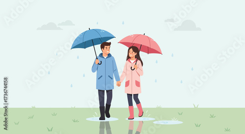 Romantic couple walking in the rain holding hands and umbrellas together outdoors