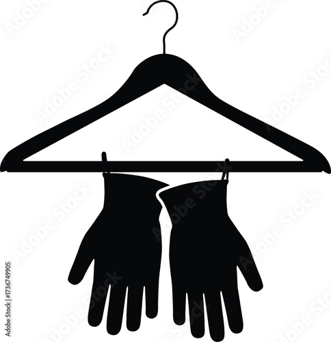 Black silhouette of winter gloves hanging on a wooden clothes hanger isolated on white background