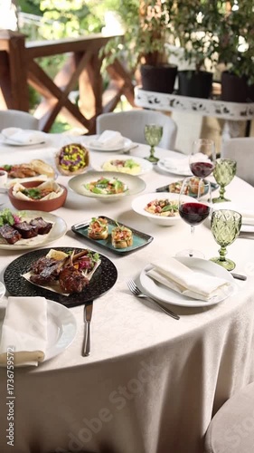 Festive banquet table in a restaurant. Served with delicious dishes. 