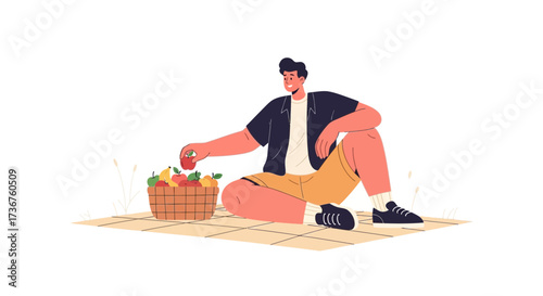 Man Enjoying Tasty Fruits During a Relaxed Picnic on a Grassy Checkered Blanket Scene