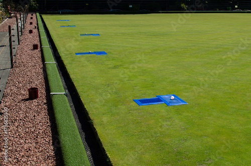Outdoor Lawn Bowling Green setup with Jack and mats.
