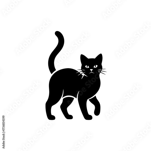 Black cat silhouette walking with tail up