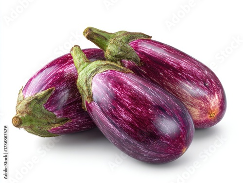 Wallpaper Mural Three fresh, striped eggplants with green stems, arranged on a clean white background Torontodigital.ca