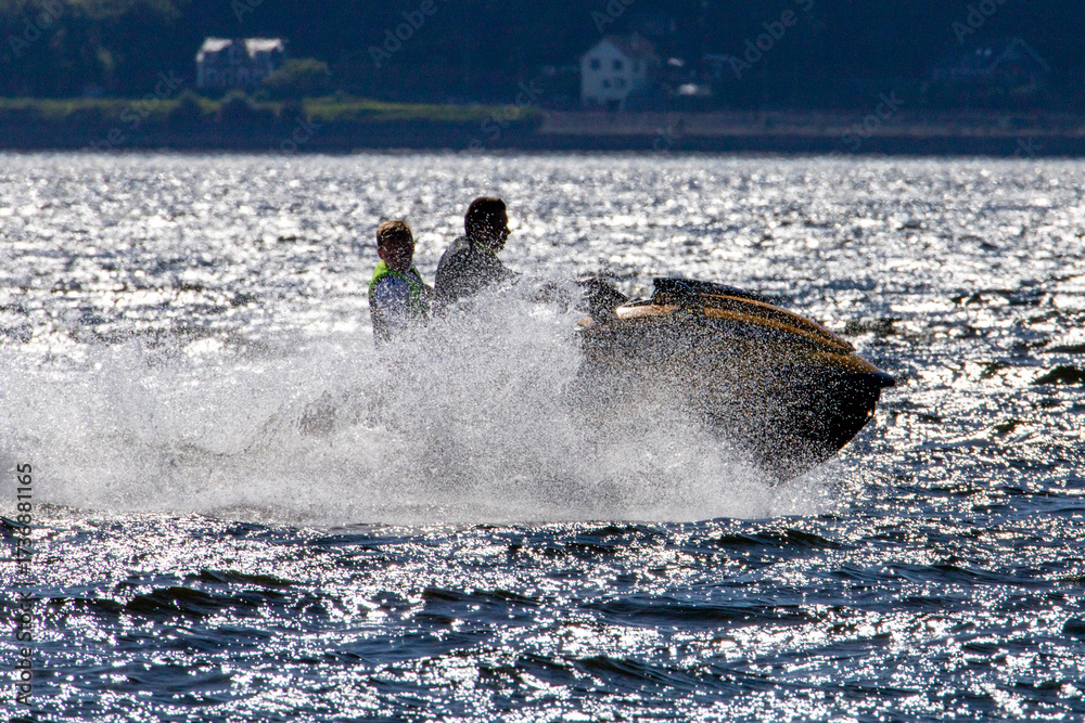 Obraz premium Jet Ski is name of a personal watercraft manufactured by Kawasaki, a Japanese company. Used to refer to any type of personal watercraft used for recreation, used as a verb to describe the use of PWC.