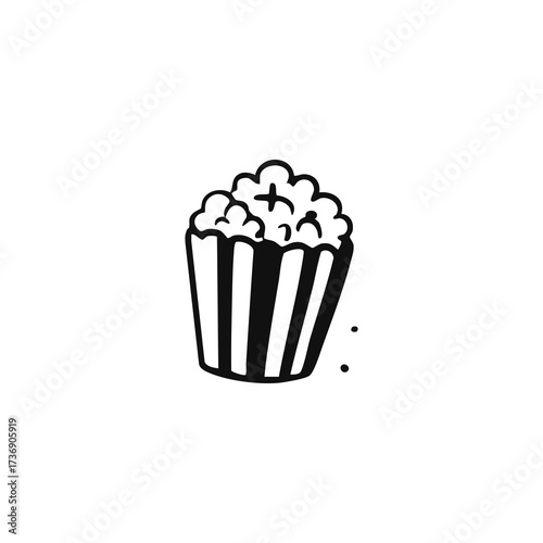Striped carton brimming with popcorn
