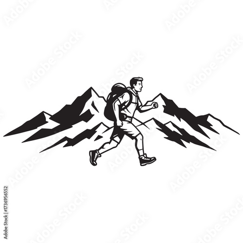 Hiker running in front of mountain range silhouette