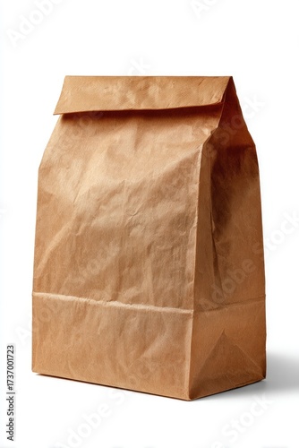 A standing brown paper bag, closed at the top, against a white backdrop with a shadow