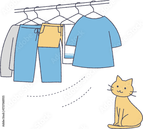 干された洗濯物と猫