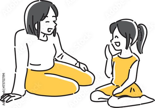 座って娘と談笑するお母さん