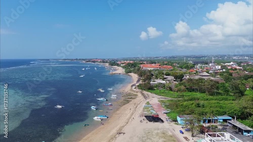 Aerial view of tourists enjoying water rides in Tanjung Benoa, Bali.
