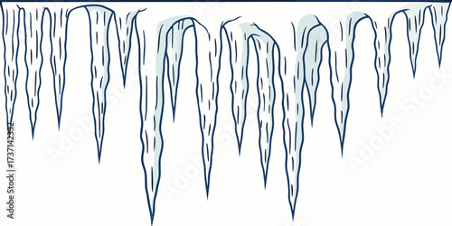 A row of icicles hanging from a ledge