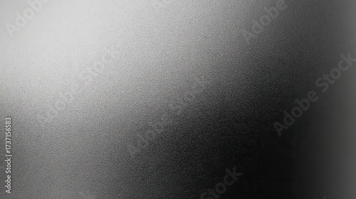 Gray gradient background with film grain texture, transitioning from light to dark tones, simple and atmospheric design, perfect for modern posters, photography overlays and graphic design projects