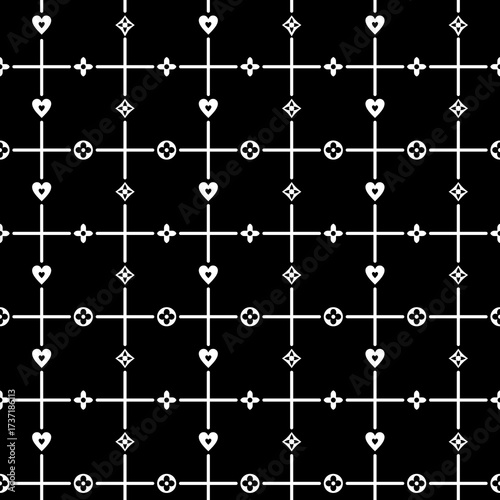 Seamless luxury monogram pattern with geometric and heart motifs in white over black background, ideal for fashion, textiles, packaging, and decoration.
