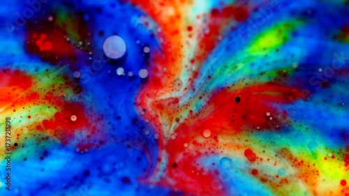 Vibrant Abstract Swirls of Color Exploding in a Cosmic Dance.