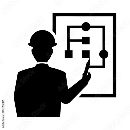 Engineer pointing at flowchart on board silhouette