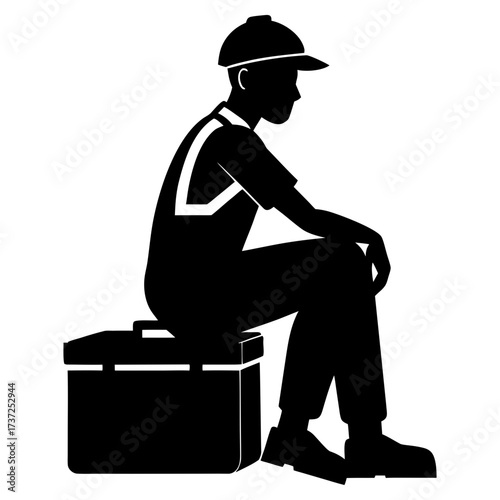 Worker in overalls and cap sitting on toolbox silhouette
