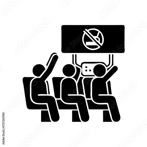 Silhouette of protestors in seats holding sign with symbol