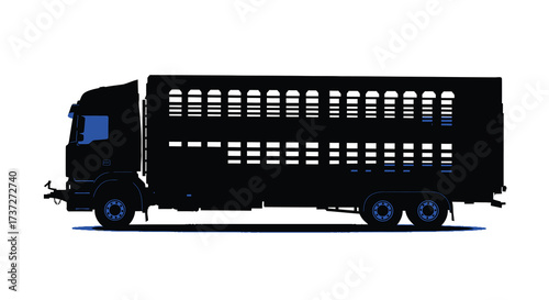 Silhouetted livestock transport truck with a double decker trailer displayed