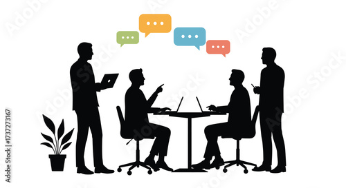 Business professionals in a meeting discussing ideas and using technology