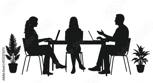Business meeting with three people around a table silhouette style