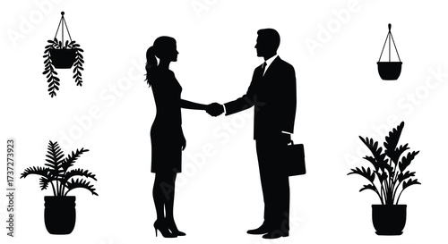 A business deal is sealed with a handshake and plant life